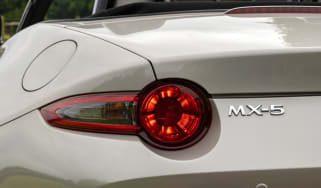 MX5 header